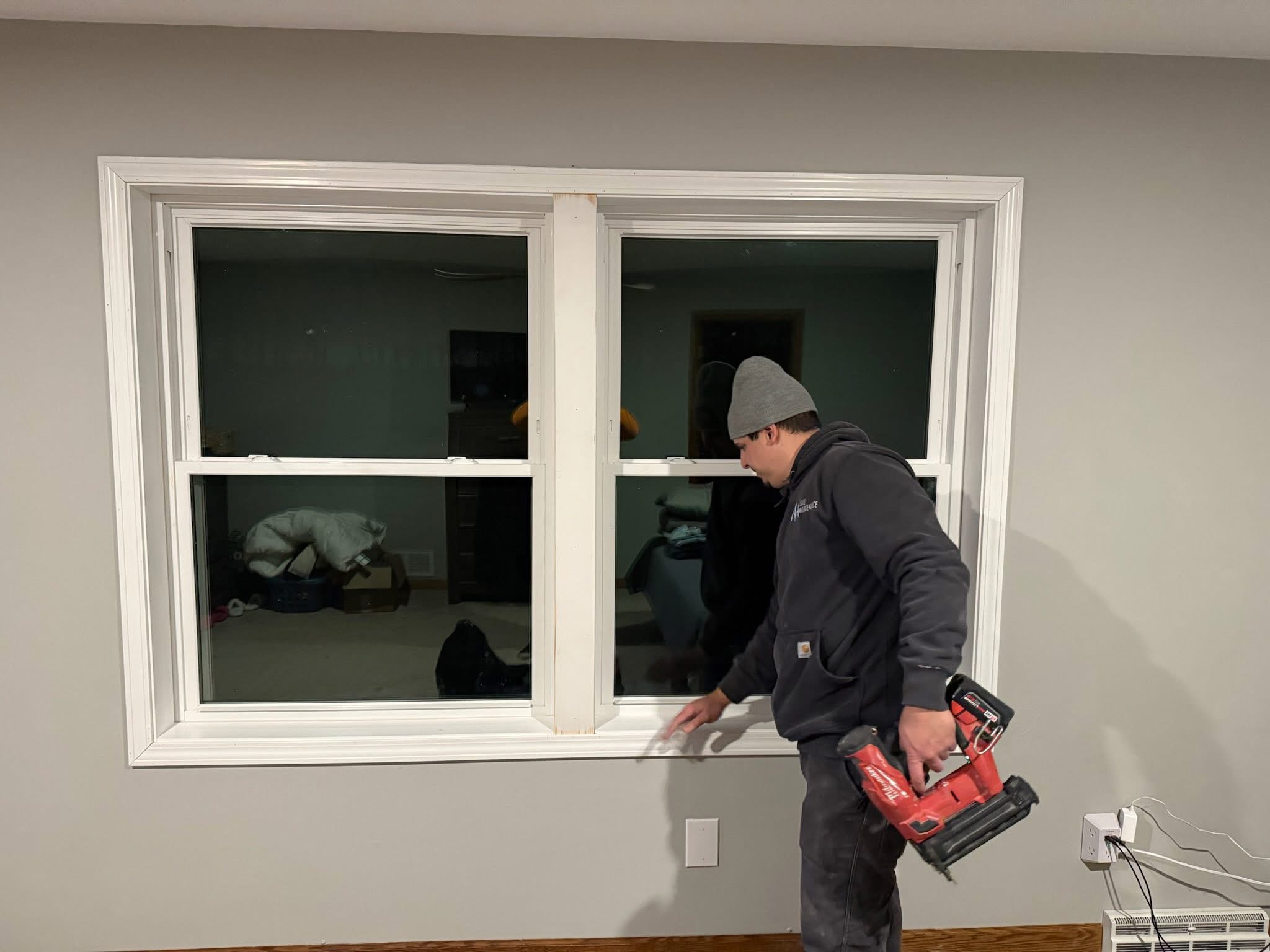 Window trim installation in progress